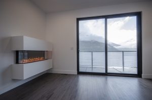 master-bed-Fireplace-1a-scaled_custom home builder Nelson BC_cycles construction